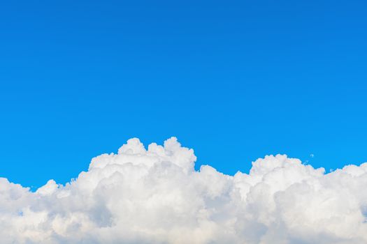 Fluffy cloud against blue sky background for summer and nature concept