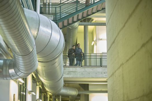 FERRARA, ITALY 25 MARCH 2020: Ferrara university building with people