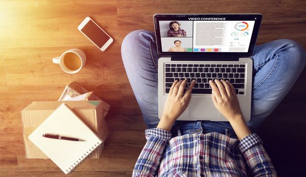 work from home. people making video conference with colleague via laptop computer during home quarantine to avoid spreading illness transmission of COVID-19 Coronavirus outbreak. Social distancing