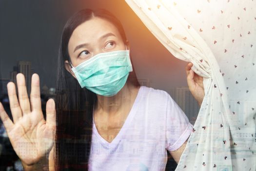 home quarantine concept. woman at risk of being infected with the Coronavirus stay isolation at home for self quarantine, prevention spreading of germs during COVID-19 Coronavirus outbreak situation