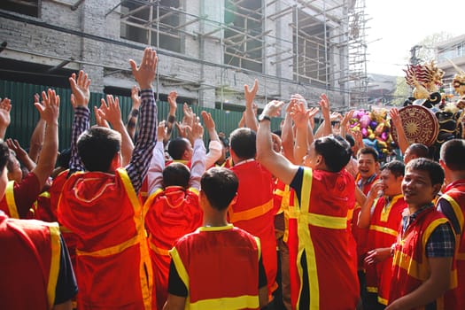 People celebrating the traditional Dong Ky Firecracker Festival or Hoi Phao Dong Ky in Bac Ninh, Vietnam