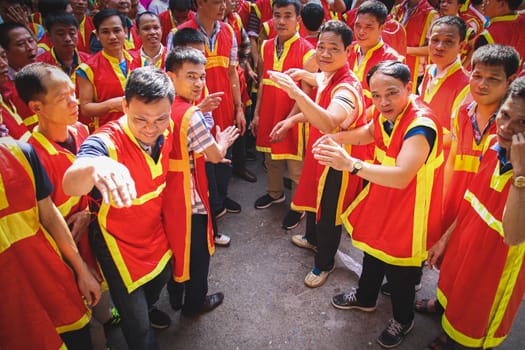 People celebrating the traditional Dong Ky Firecracker Festival or Hoi Phao Dong Ky in Bac Ninh, Vietnam