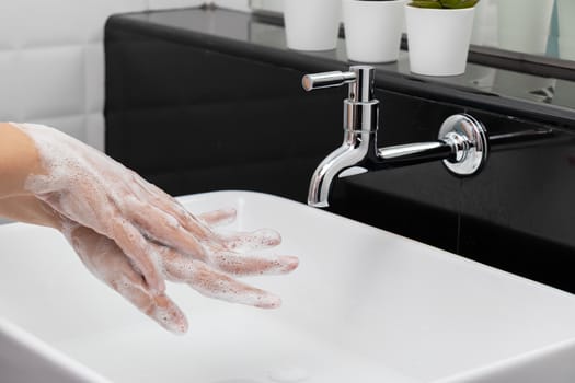 personal hygiene. washing hands, rubbing hand thoroughly with soap that has a lot of bubbles for cleaning and disinfection, prevention of spreading of germs during infections of COVID-19 Coronavirus outbreak situation