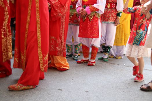 Women called Hoi dong tue wearing festival clothes during a parade for Hoi Phao Dong Ky or Dong Ky Firecracker Festival in Bac Ninh, Vietnam