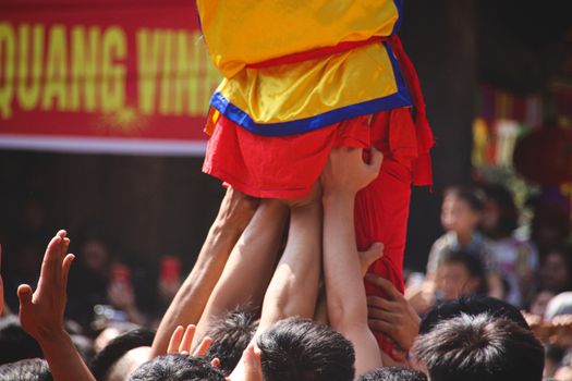 Vietnamese people celebrating the traditional Dong Ky Firecracker Festival in Bac Ninh, Vietnam