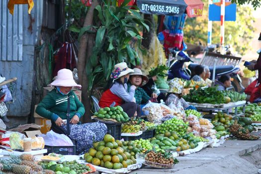 Editorial. Market vendors in selling local fresh produce in Hoi an, Vietnam