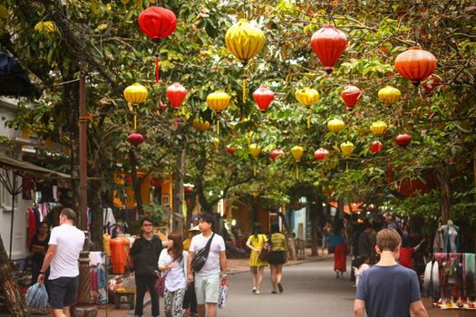 Editorial. Crowd of tourist exploring the Ancient Town in Hoi an, Vietnam