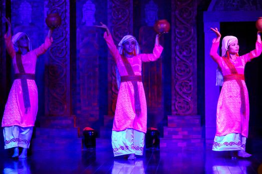 Editorial. A dancer performs a traditional Vietnamese folk dance in My Son Sanctuary in Hoi an, Vietnam