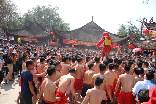 “Ong dam” procession at the communal house during the Dong Ky Firecracker Festival or Hoi Phao Dong Ky in Bac Ninh Vietnam