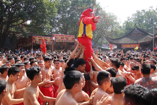 “Ong dam” procession at the communal house during the Dong Ky Firecracker Festival or Hoi Phao Dong Ky in Bac Ninh Vietnam