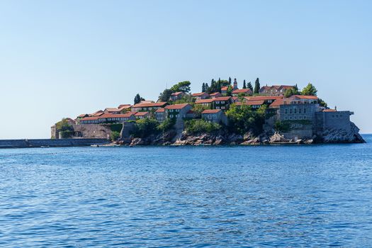 St. Stephen's island off the coast of Montenegro, view from the sea but with a background of water and sky