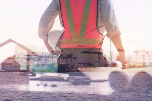 Double Exposure of Engineer in Safety Equipment on Shipping Terminal Industry Background, Technician Man Operator of Handling Container Shipment Freight. Business Transportation and Logistics Industry