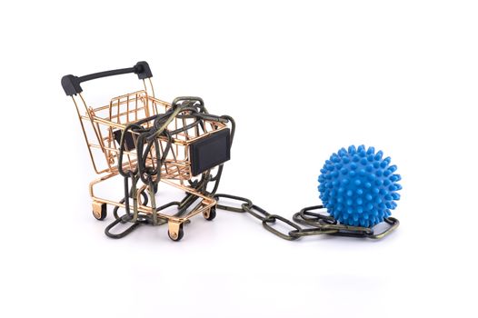 Virus pandemic and trade restriction concept with empty shopping trolley wound round a metal chain and blue virus molecule model isolated on white background