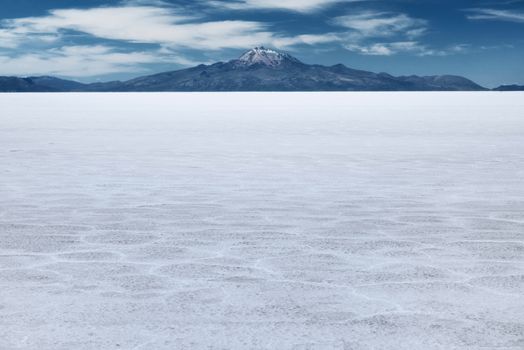 The World's Largest Salt Flat And Dormant Volcano Tunupa At The Far Background,  Salar De Uyuni, Bolivia