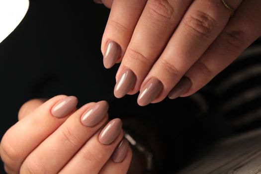 Perfect manicure and natural nails. Attractive modern nail art