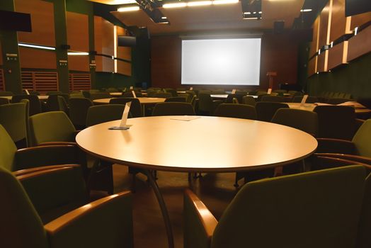 Interior of a modern company meeting room, nobody before the meeting begins. business