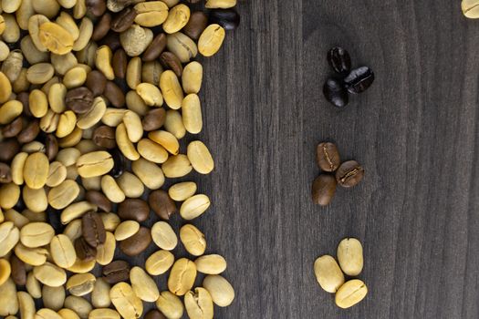 Striped coffee beans isolated in a wooden background