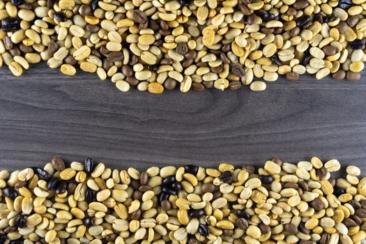 Striped coffee beans isolated in a wooden background