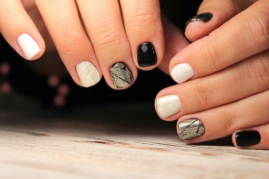 Perfect manicure and natural nails. Attractive modern nail art