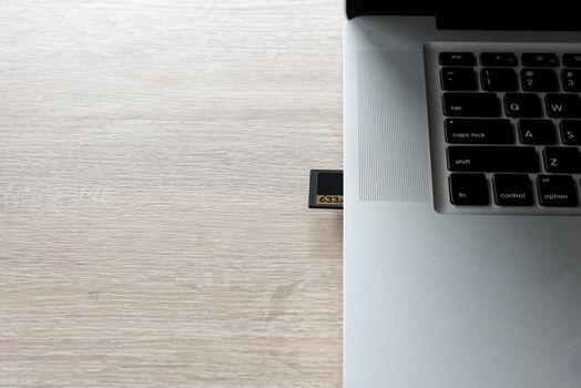 memory card of camera in laptop to transfer photos