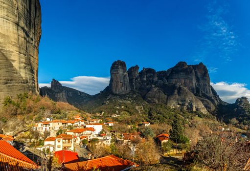 Greek houses on the hills  among steep cliffs of Meteora mountains, Kalabaka, Thessaly, Greece