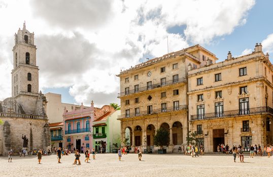 San Francisco square with cathedral bell tower and old buildings, center of Old Havana, Cuba