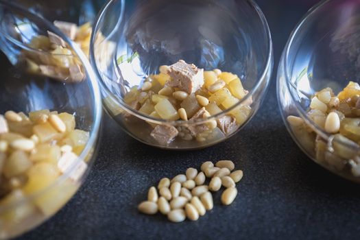 Verrine of pear foie gras and pine nuts in French cuisine