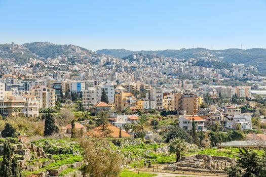 Mediterranean city historic center panorama with ruins and residential buildings in the background, Biblos, Lebanon