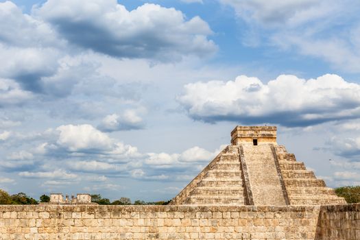 Temple of Kukulcan or the Castle and stone wall in foreground, the center of the Chichen Itza maya archaeological site, Yucatan, Mexico8