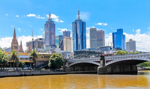 Melbourne Central business district skyscrapers with bridge over the river, Victoria, Australia
