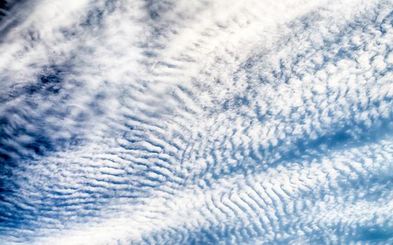 Blue Sky with Stripes Clouds Texture with copy space, may use as background