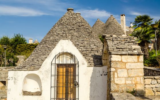 Typical trulli buildings with conical roofs in Alberobello, Apulia, Italy