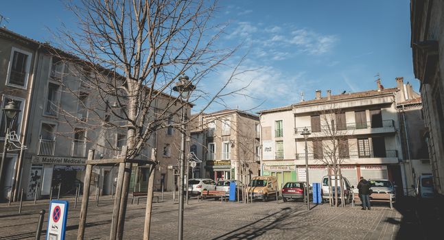 Marseillan, France - December 30, 2018: architectural detail of small typical townhouses in the historic town center of a small fishing port in the south of France on a winter day