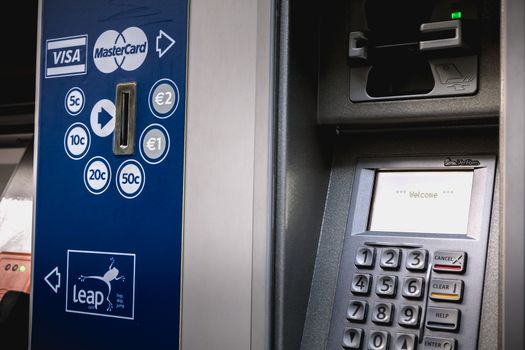 Dublin, Ireland - February 15, 2019: Automatic ticket purchase machine in Connolly DART train station (Staisiun ui Chonghaile) on a winter day