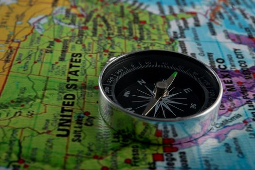 Compass with map background. Travel concept.