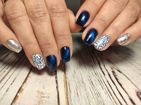 Fashion nails manicure on beautiful hands