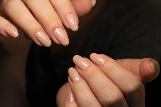 Beautiful woman's nails with beautiful christmas manicure studio