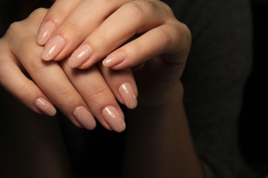 Beautiful woman's nails with beautiful christmas manicure studio