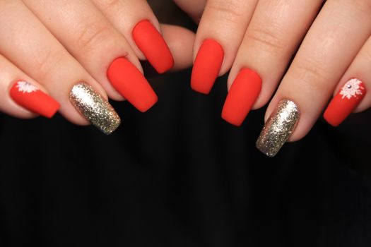 Closeup photo of a beautiful female hands with elegant manicure and diamond rings.