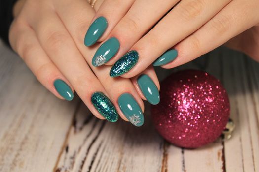 Colorful Christmas nails winter nail designs with glitter,rhinestones, on short and long female nails.