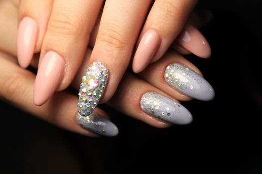 Colorful Christmas nails winter nail designs with glitter,rhinestones, on short and long female nails.