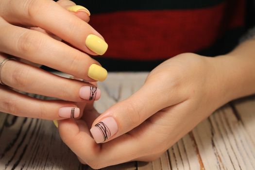Abstract New Year design on women's nails. Isolated.
