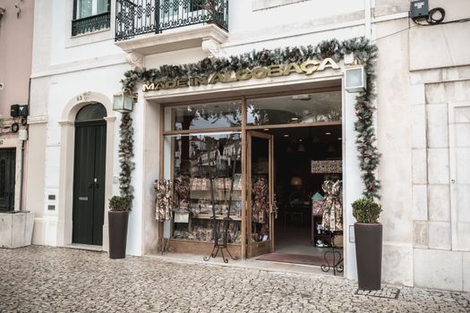 Albobaca, Portugal - April 13, 2019 - View of the storefront of a souvenir shop of historic town center on a spring day