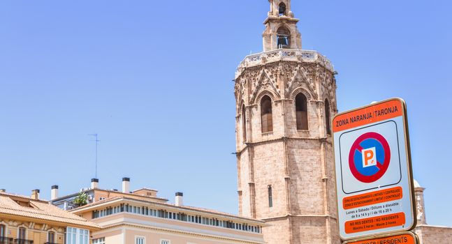 Valencia, Spain - June 16, 2017: road sign indicating an Orange parking area (Zona Naranja) and a limited and controlled parking area in the dentre city on a summer day