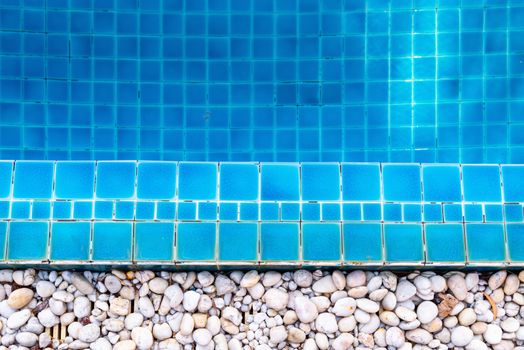 Abstract Swimming Pool Floor Tiles and Mable Paving, Flooring Textured and Decorative Design of Poolside. Beautiful of Tile Pattern Background and Reflection of Water in Swimming Pool.