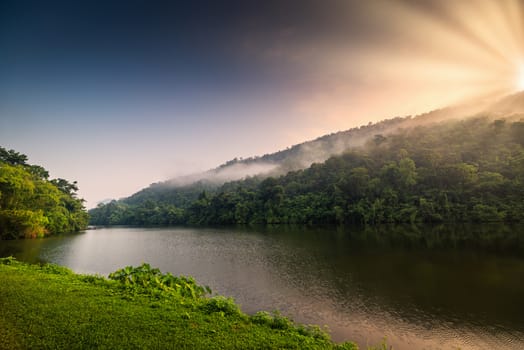 Landscape Scenery View of Mountain Range Against Blue Sky Background at Sunrise, Scenic Tranquil Nature With Beautiful Lake at The Morning. Panoramic Nature Outdoors