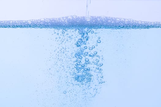 Light blue bubbles and water White background