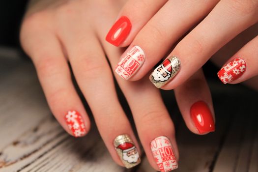 Abstract New Year design on women's nails. Isolated.