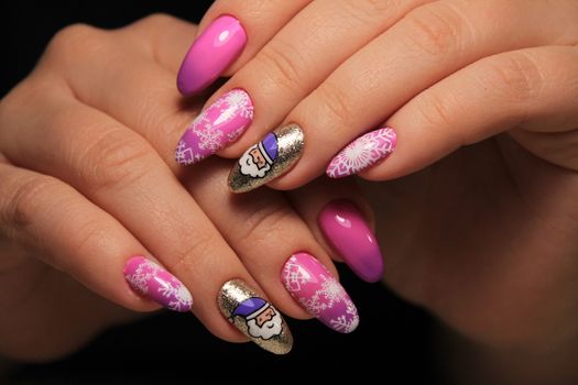 Closeup photo of a beautiful female hands with elegant manicure and diamond rings.