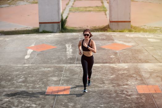 Asian women Running and jogging during outdoor on city run